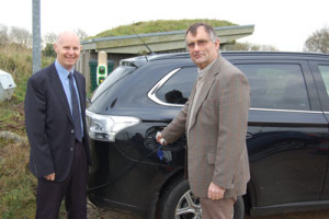 National Park Authority Chief Executive Tegryn Jones is pictured with Authority Member Cllr Bob Kilmister, who was one of the first to use the new electric car charging point at Oriel y Parc.