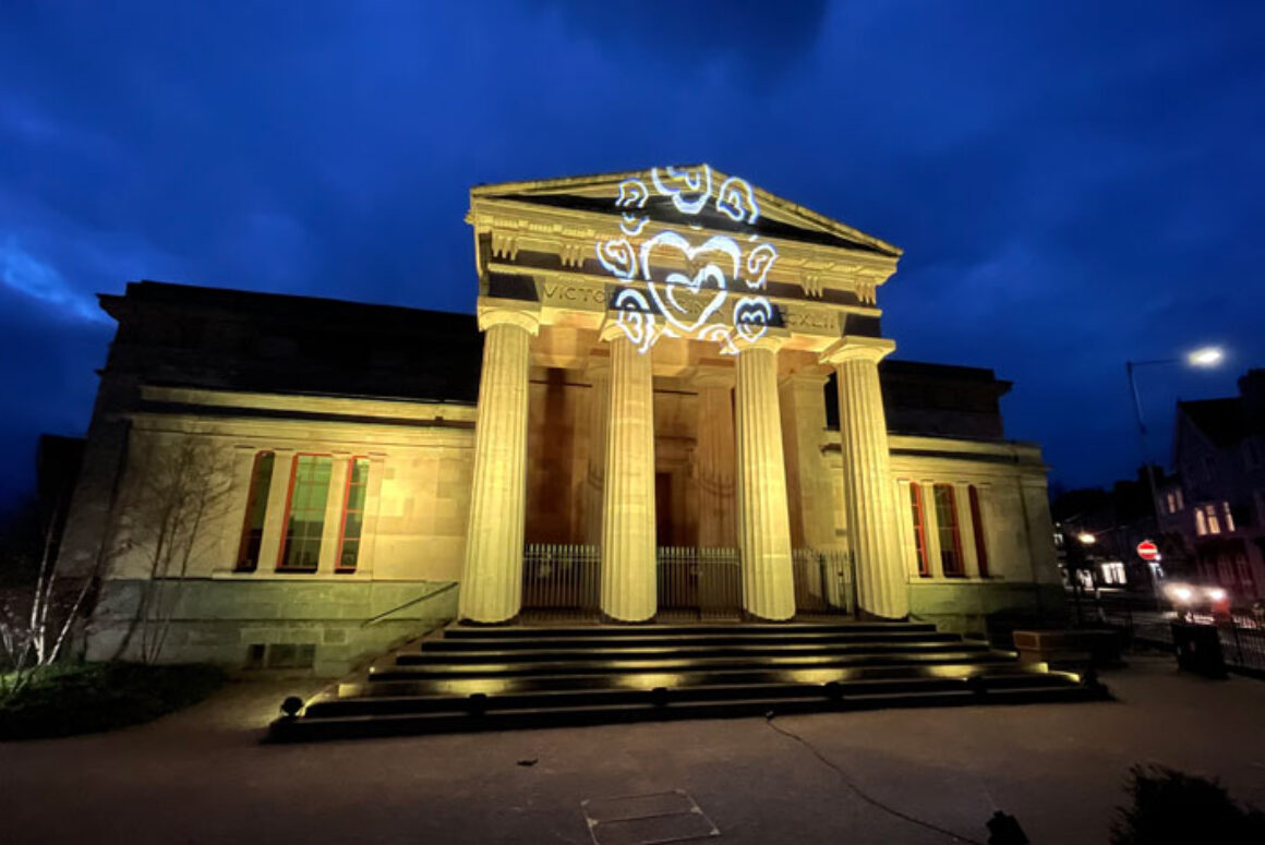 Three Council Buildings Lit Up in Yellow to Remember Victims of Covid-19