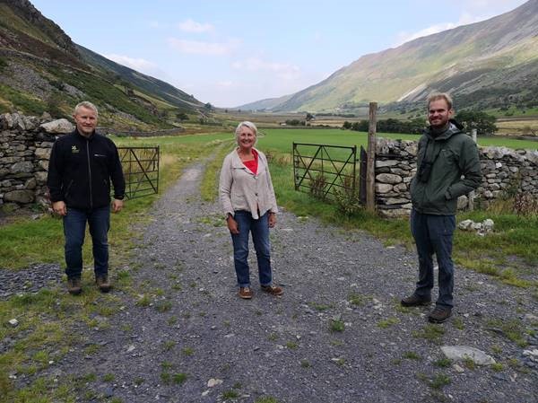 Dewi Roberts of the National Trust, Siân Gwenllian MS, Jack Slatery, RSPB Cymru Conservation Officer shown in North Wales home of the Twite