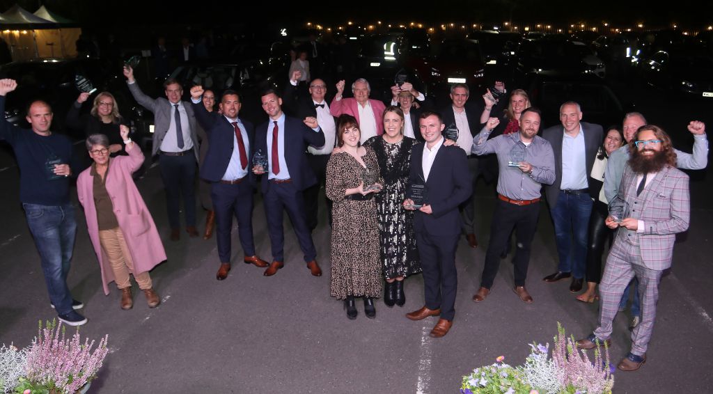 Aled Woosnam and Evie Williams from AL Technical and 23 Social receive the Powys Business of the Year Award from Councillor Iain Mackintosh, portfolio holder for housing, planning and economic regeneration at Powys County Council, sponsor, watched by Bob Benyon, one of the judges.