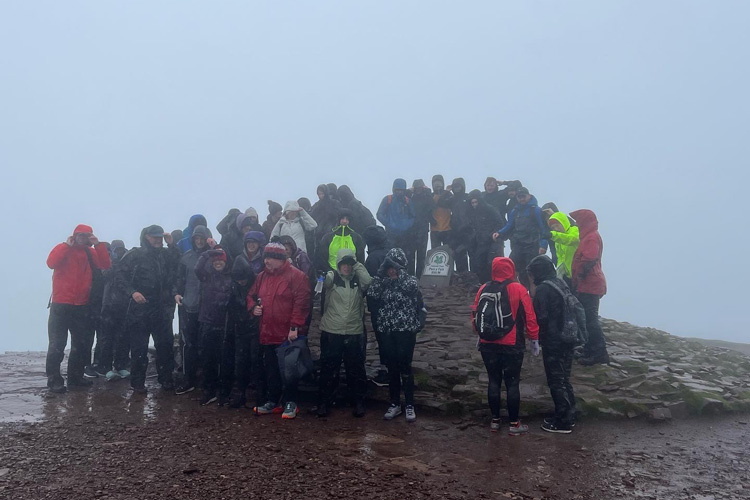 Ashmole & Co Staff Walk Up Pen Y Fan For Wales Air Ambulance