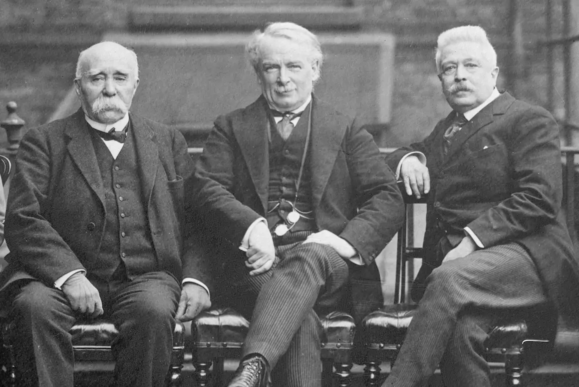 Lloyd George (centre) at the Paris Peace Conference after WW1 with French PM George Clemenceau (left) and Italian PM Vittorio Orlando (right).[Source]