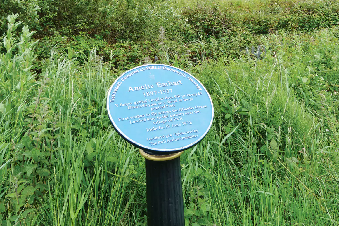 Blue plaque on the Millennium Coastal path, Pwll Blue plaque on the Millennium Coastal path, Pwll