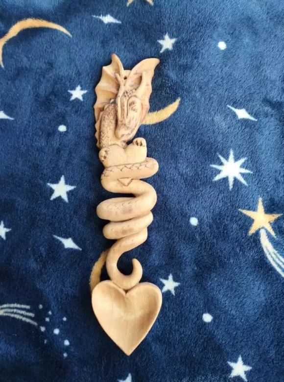 Dolphins in the Flowers: The Story Behind Andie’s Love Spoons