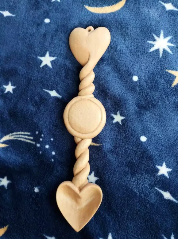 Dolphins in the Flowers: The Story Behind Andie’s Love Spoons