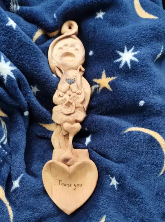 Dolphins in the Flowers: The Story Behind Andie’s Love Spoons