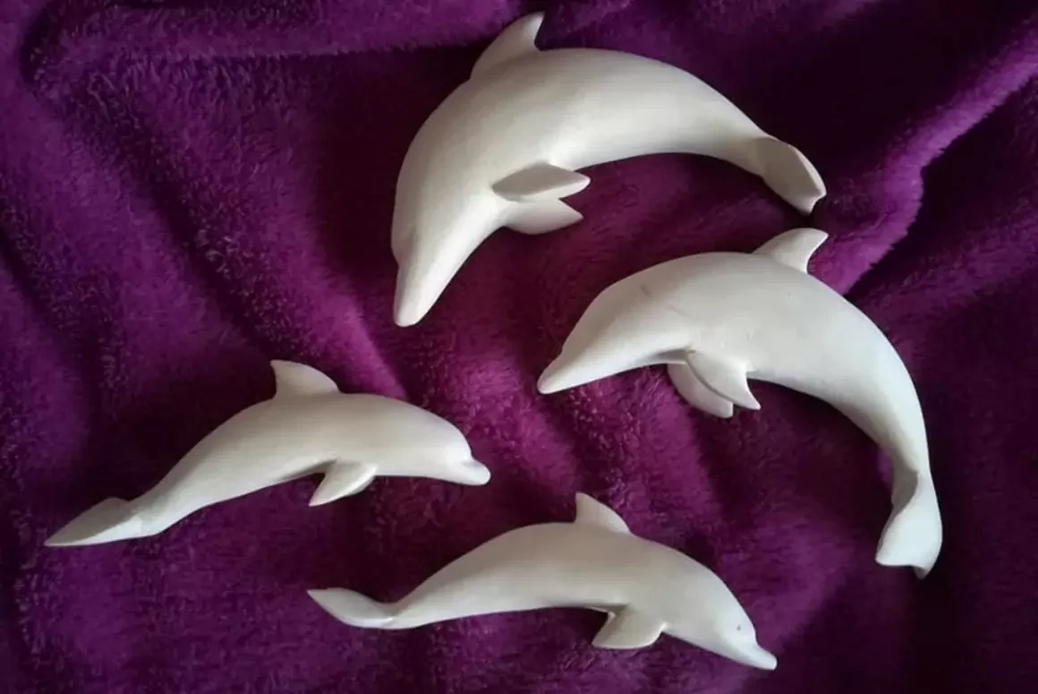 Dolphins in the Flowers: The Story Behind Andie’s Love Spoons
