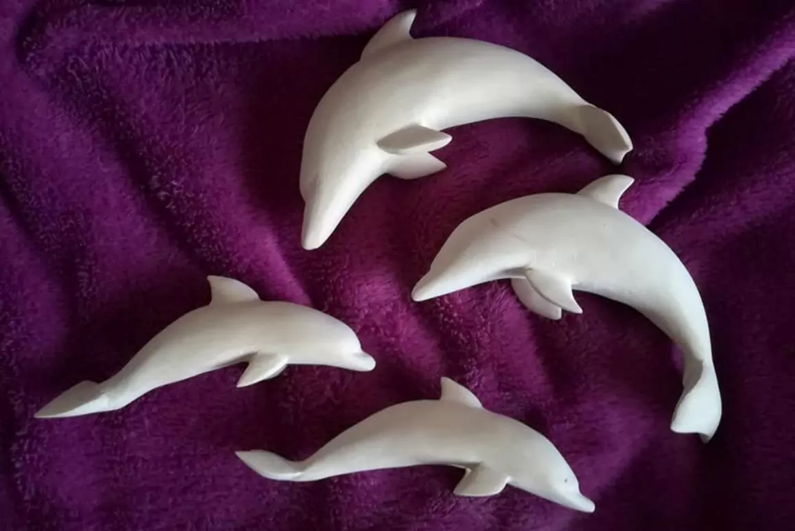 Dolphins in the Flowers: The Story Behind Andie’s Love Spoons