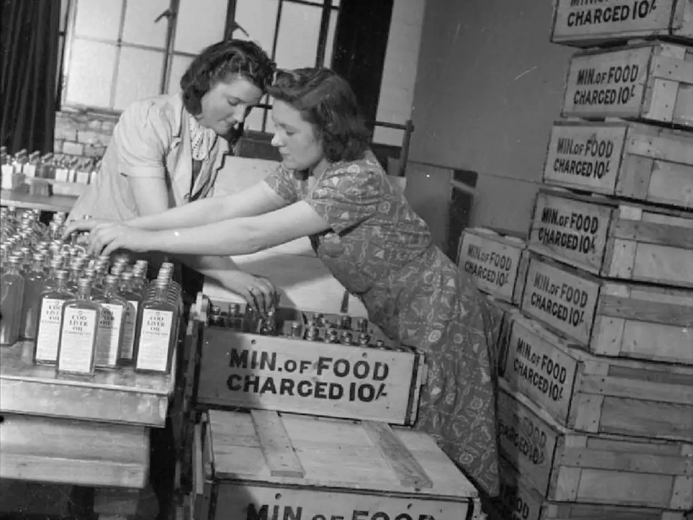 Albert Rigby and Patricia Wrigley Women packing bottles of cod liver oil into crates for the Ministry of Food. (Public Domain, Source)