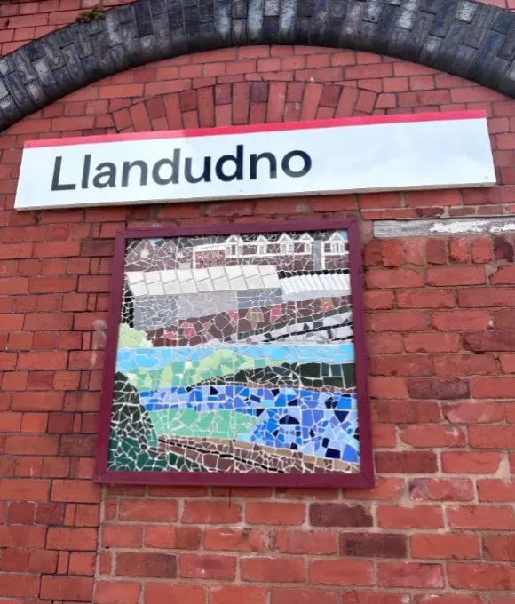 Young People Reveal New Mosaic at Llandudno Railway Station