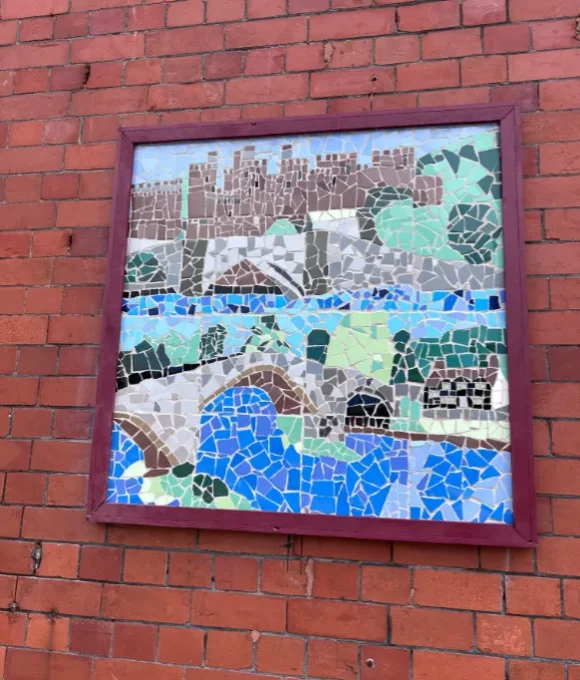 Young People Reveal New Mosaic at Llandudno Railway Station