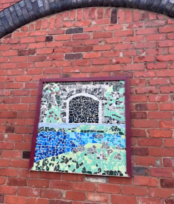 Young People Reveal New Mosaic at Llandudno Railway Station