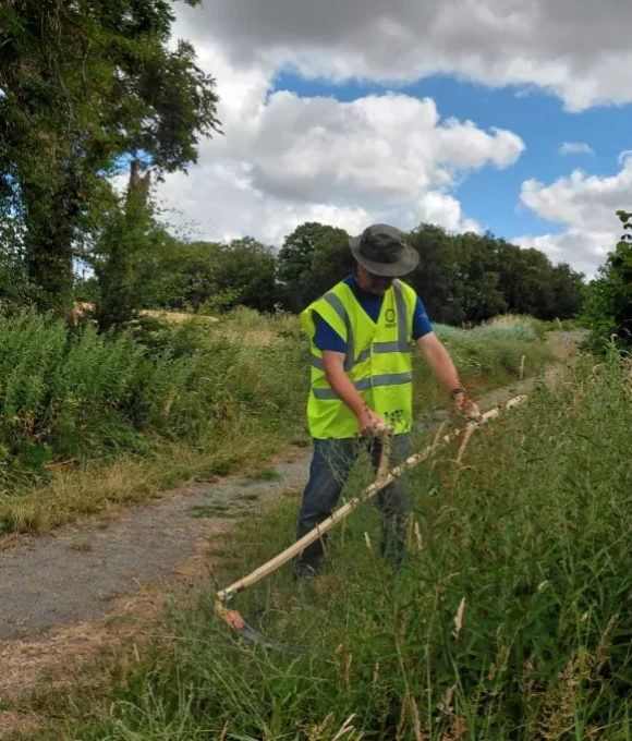 Canal & River Trust Volunteers Scything Ahead at Nature Reserve Canal & River Trust Volunteers Scything Ahead at Nature Reserve